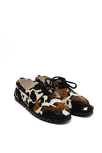 Handcrafted Gondolina Rodeo boat shoes in cow print, featuring authentic Venetian design, close-up
