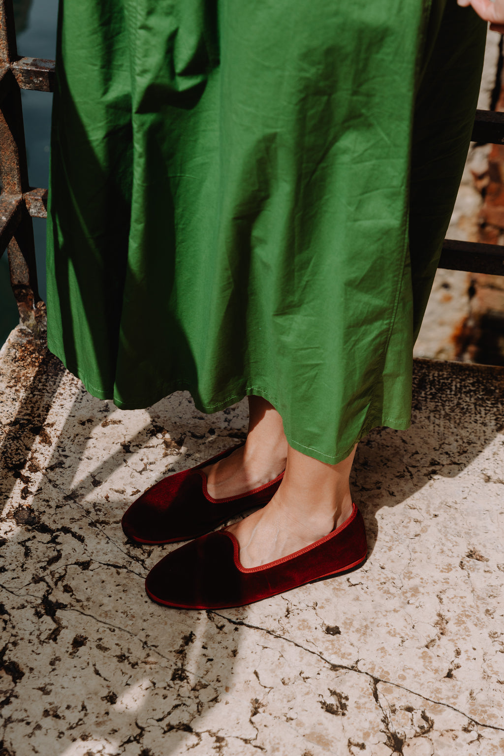 Handcrafted Gondolina Dogale flats in red velvet, featuring authentic Venetian design, lifestyle