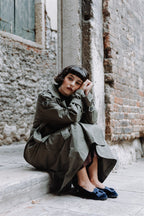 Handcrafted Gondolina Lagazuoi fringe tassel flats in blue velvet, featuring authentic Venetian design, worn by model