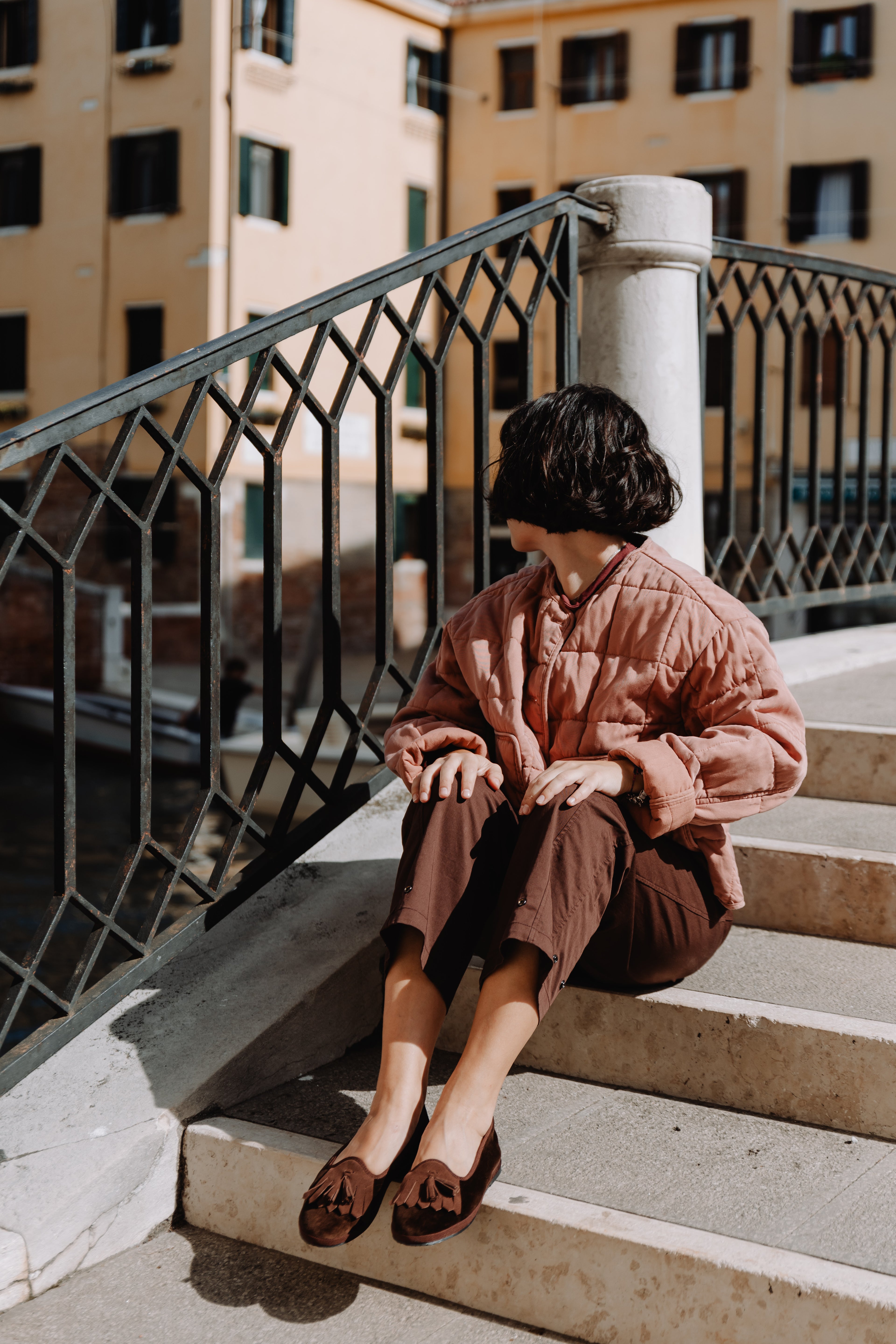 Handcrafted Gondolina Loita fringe tassel flats in brown velvet for women, featuring authentic Venetian design, worn by model