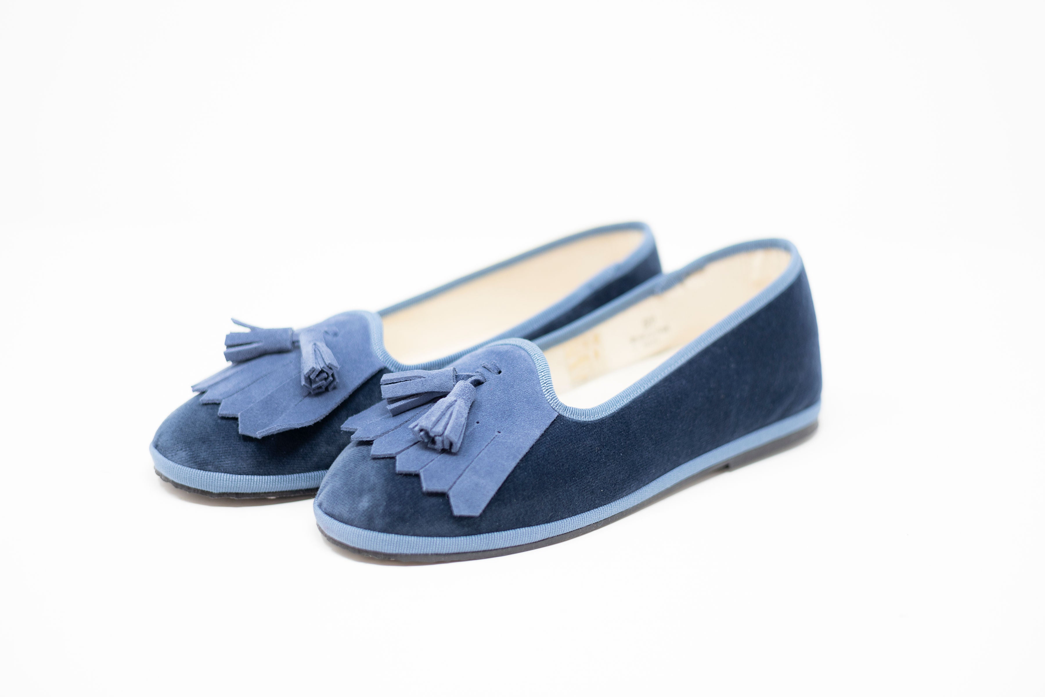 Handcrafted Gondolina Monte Cristallo fringe tassel flats in light blue velvet, featuring authentic Venetian design, close-up