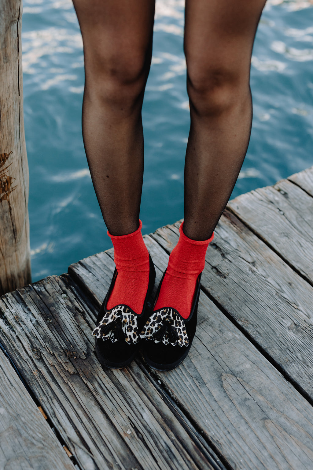 Handcrafted Gondolina Olympia tassel flats in black and leopard fringe in velvet, featuring authentic Venetian design, filestyle