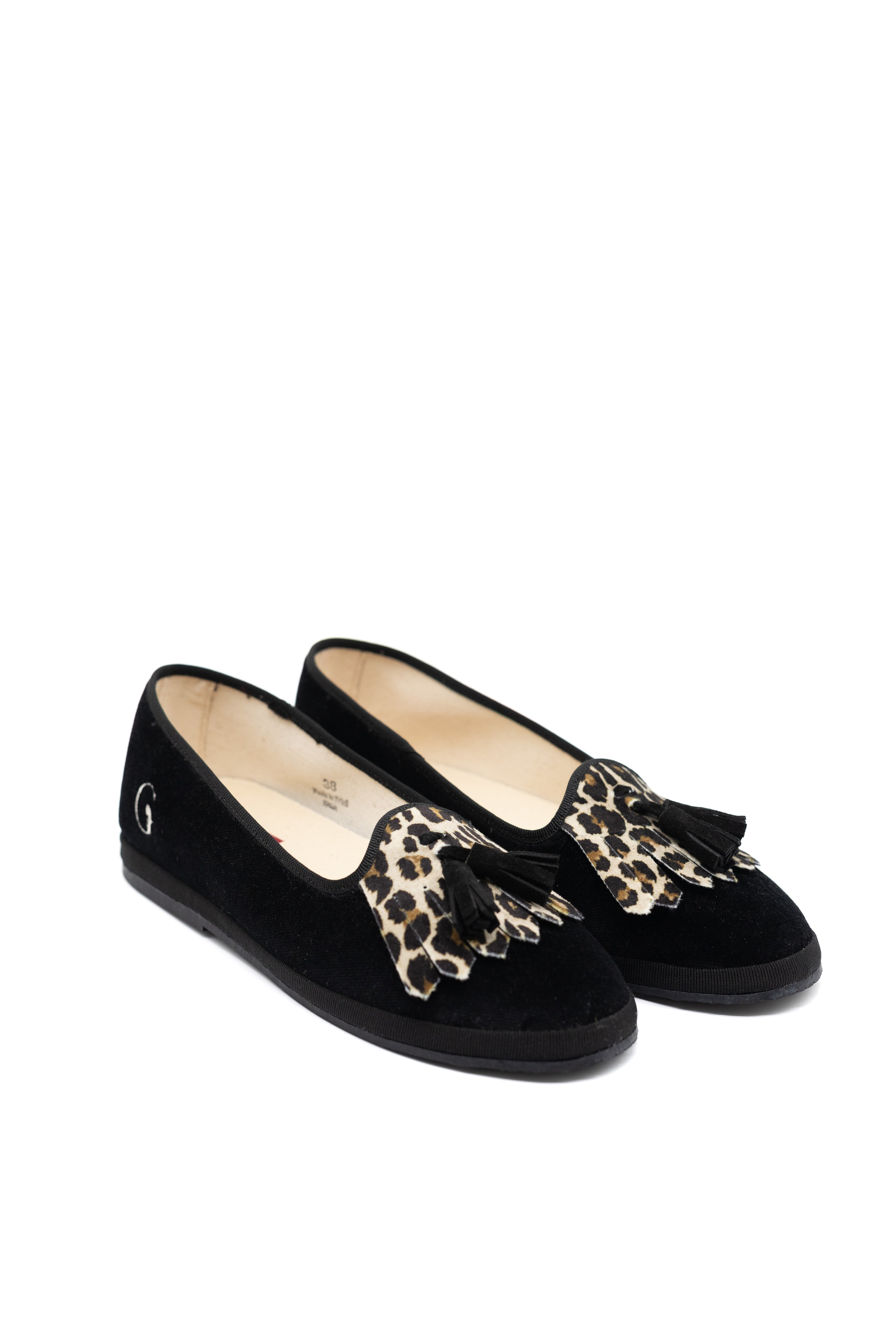 Handcrafted Gondolina Olympia tassel flats in black and leopard fringe in velvet, featuring authentic Venetian design, close-up