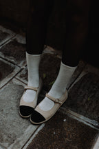 Handcrafted Gondolina Damier Mary Jane in nude velvet with toe in black suede, featuring authentic Venetian design, lifestyle