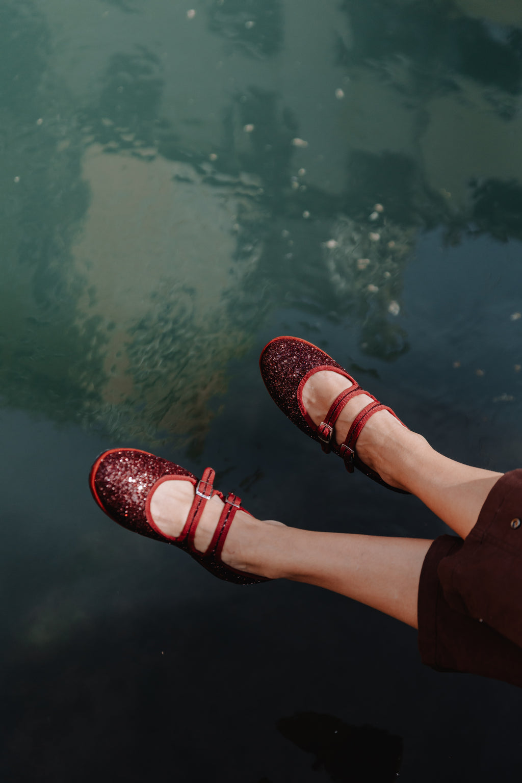 Handcrafted Gondolina Giudecca Mary Jane in burgundy glitter, featuring authentic Venetian design, lifestyle detail