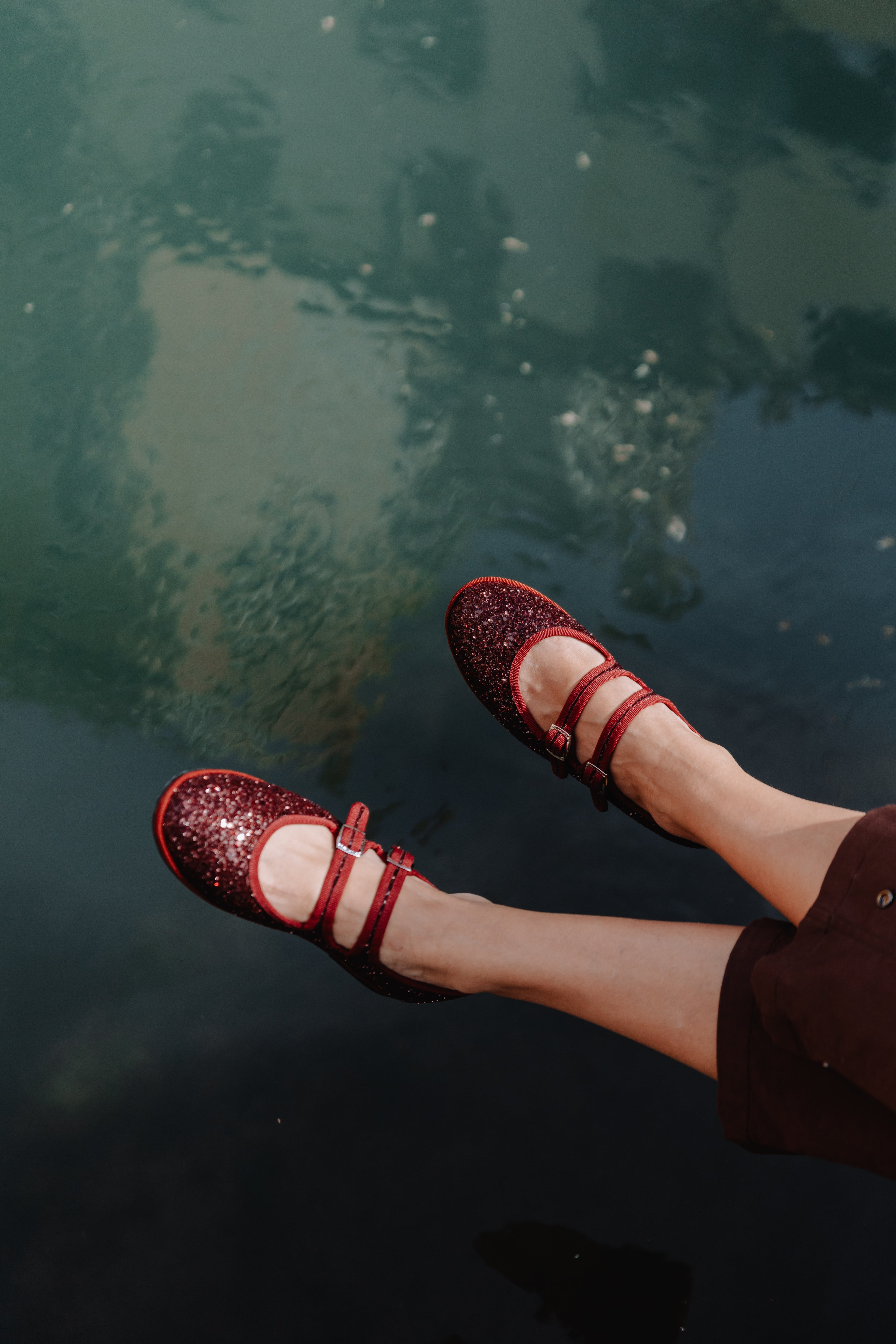 Handcrafted Gondolina Giudecca Mary Jane in burgundy glitter, featuring authentic Venetian design, lifestyle detail