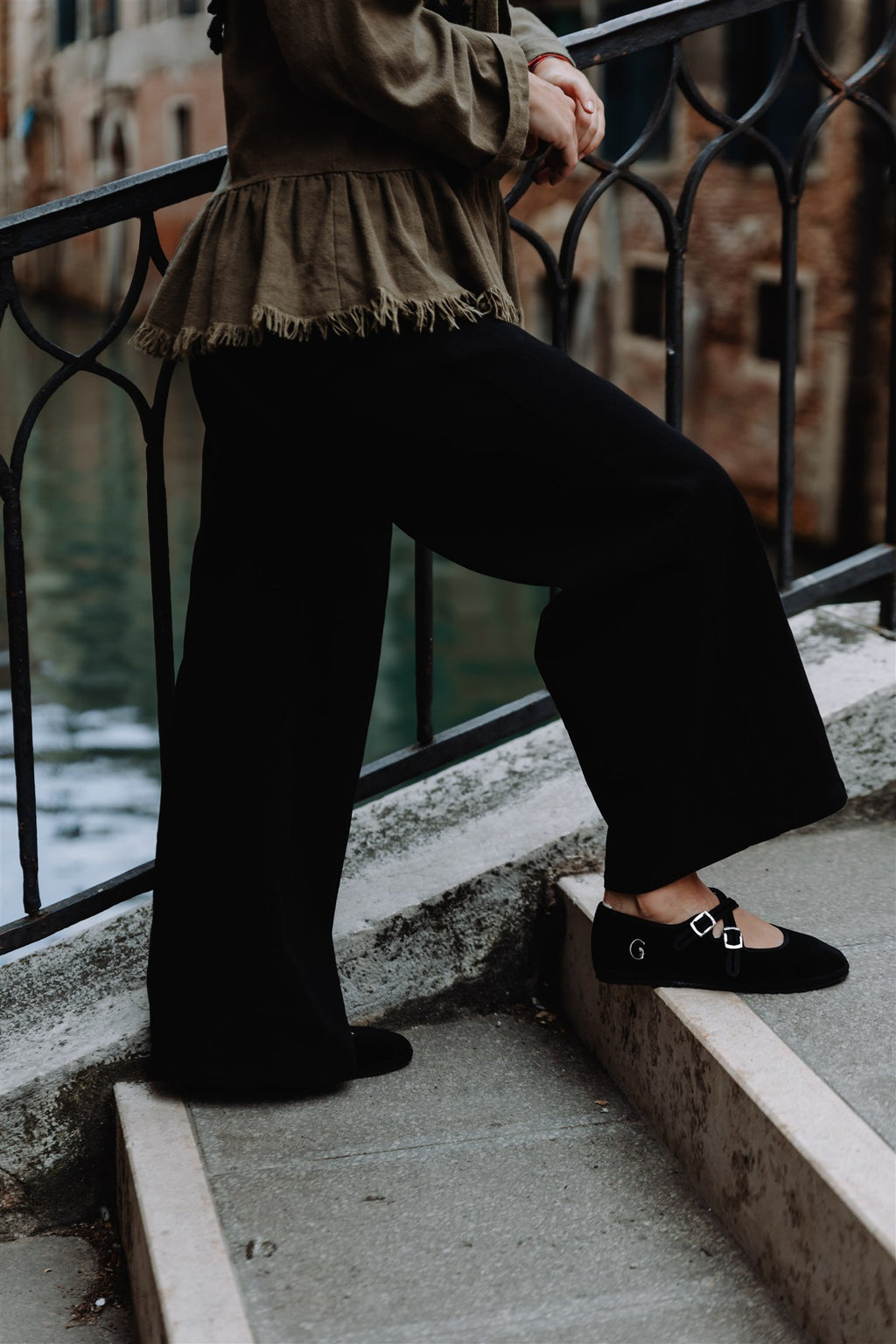 Handcrafted Gondolina Mary Jane in black velvet, Gondola style featuring authentic Venetian design, worn by model