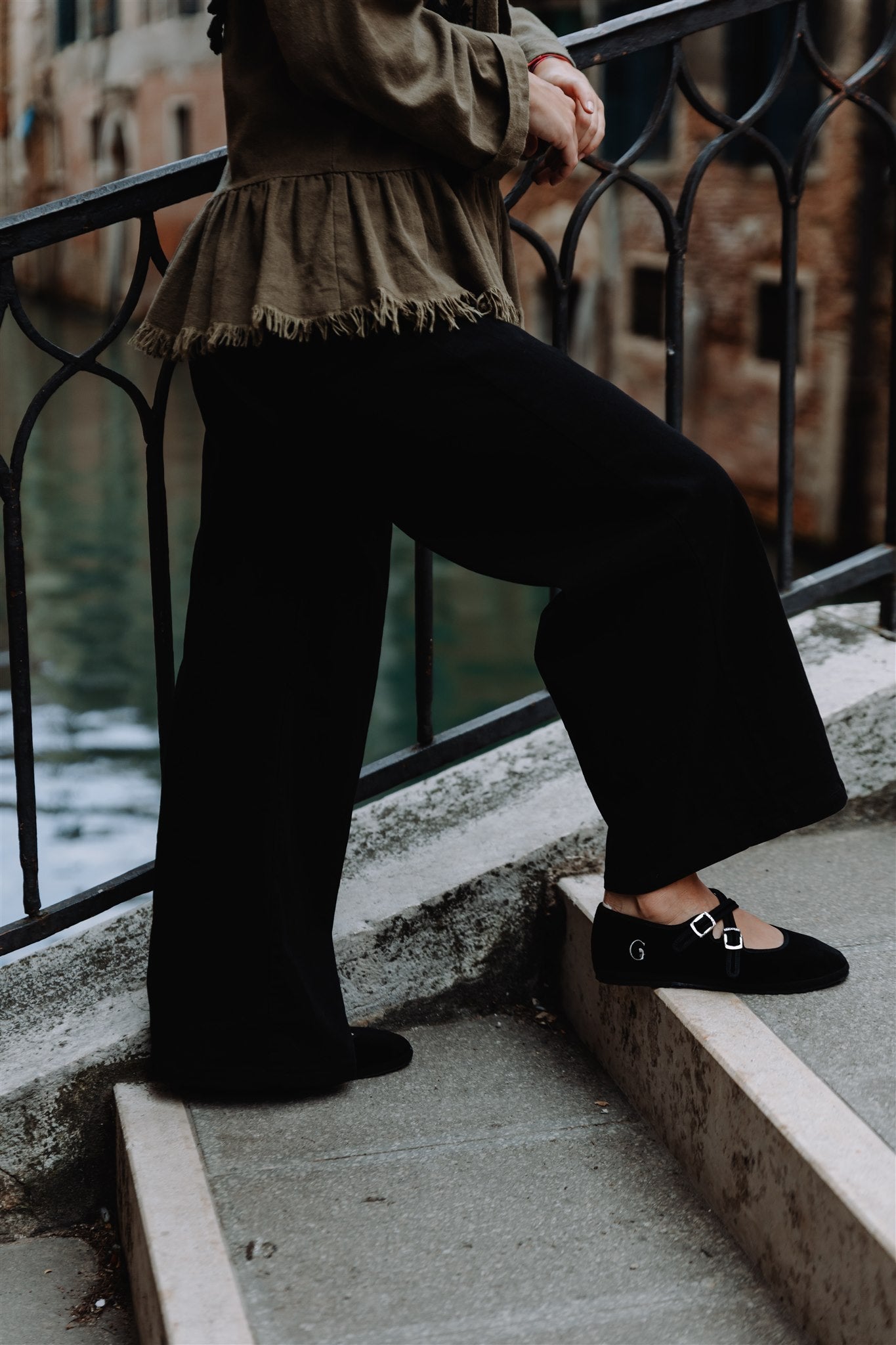 Handcrafted Gondolina Mary Jane in black velvet, Gondola style featuring authentic Venetian design, worn by model