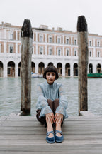 Handcrafted Gondolina Rialto Mary Jane in light blue velvet, featuring authentic Venetian design, worn by model