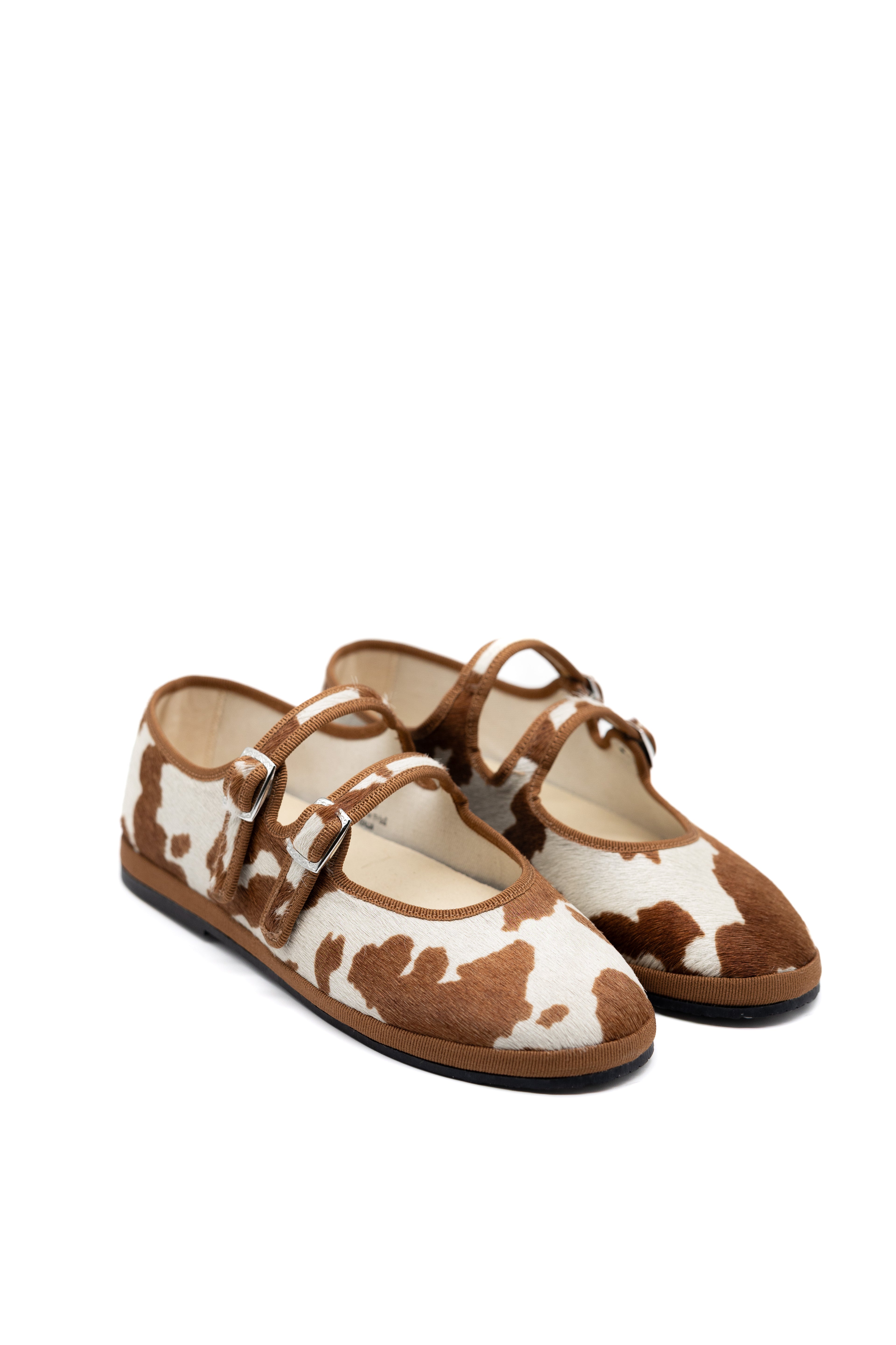 Handcrafted Gondolina Rodeo Mary Jane in cow print, featuring authentic Venetian design, close-up