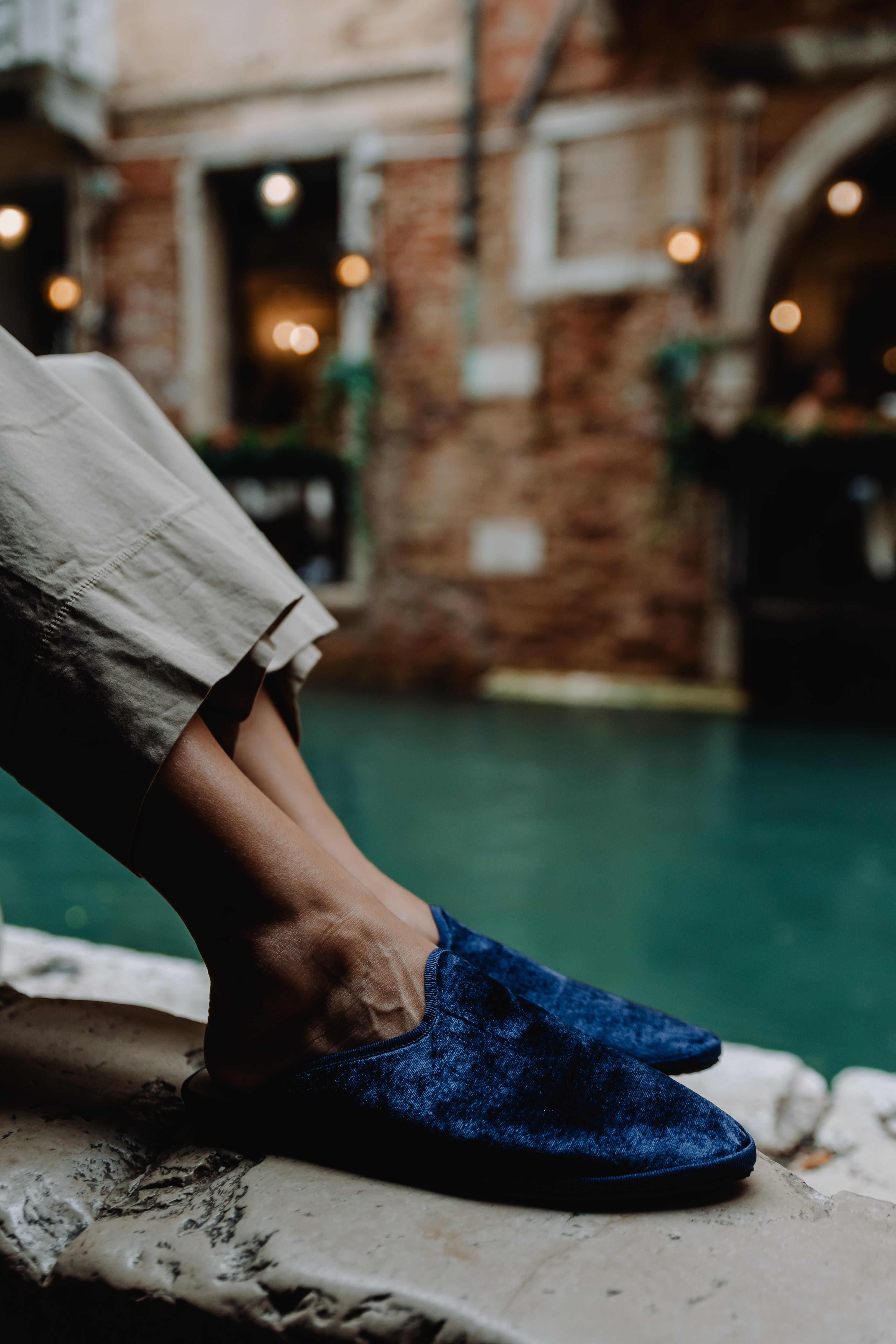 Handcrafted Gondolina Murano Mules in blue silk velvet, featuring authentic Venetian design, lifestyle